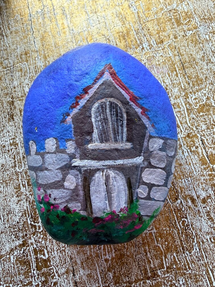 Painted stone No. 3, decorated as: Stone cottage