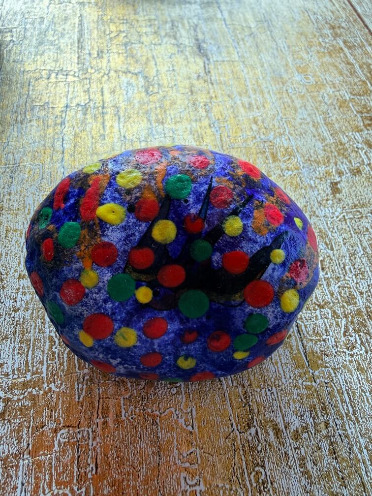 Painted stone No. 22, decorated as: Blue with red/green/yellow dots