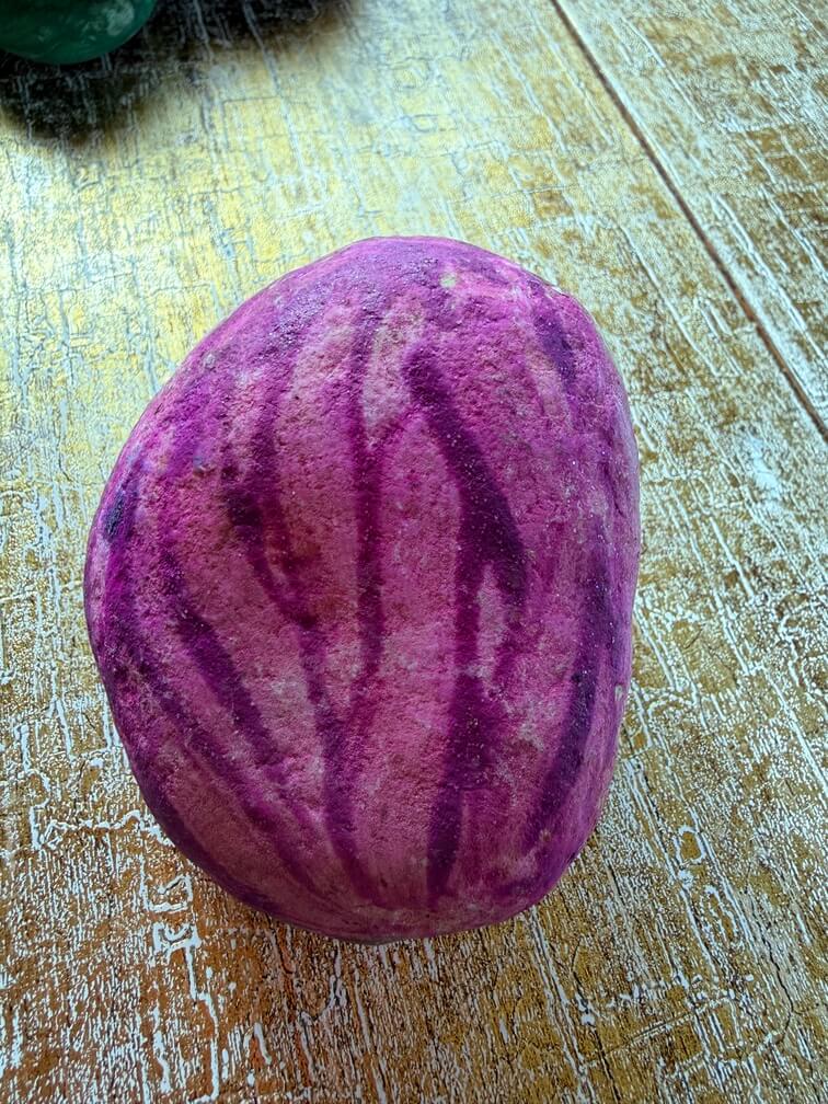 Painted stone No. 28, decorated as: Pink finger paint