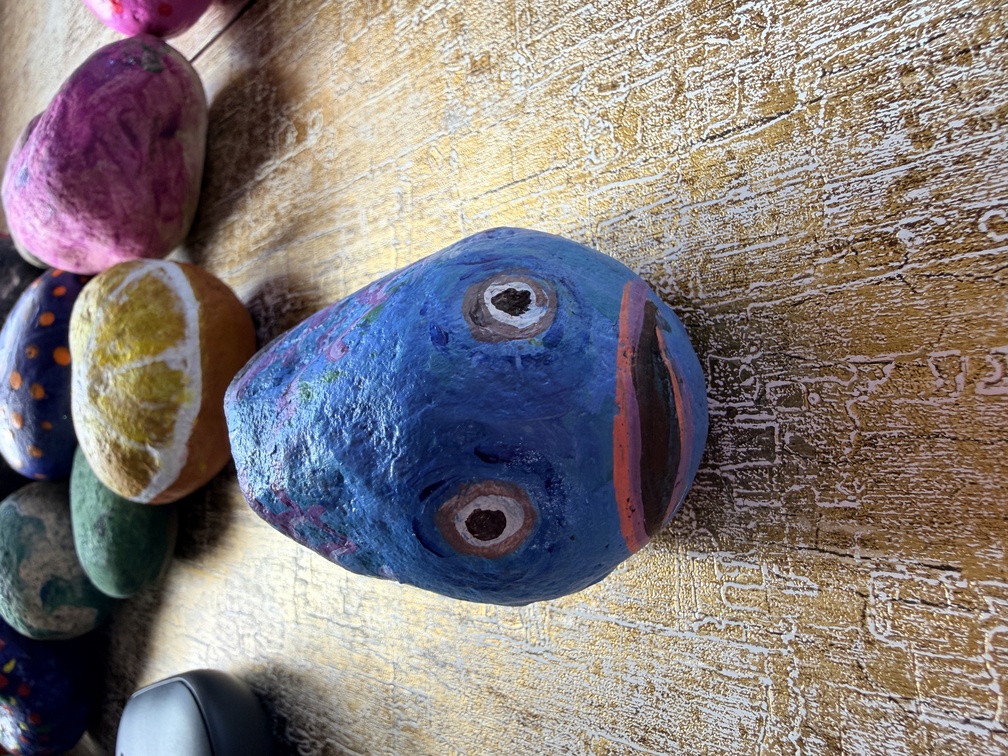 Painted stone No. 35, decorated as: Shocked fish