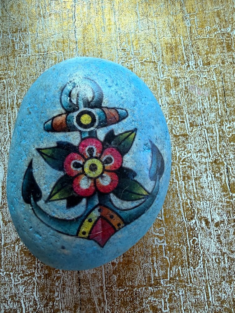 Painted stone No. 36, decorated as: Blue anchor