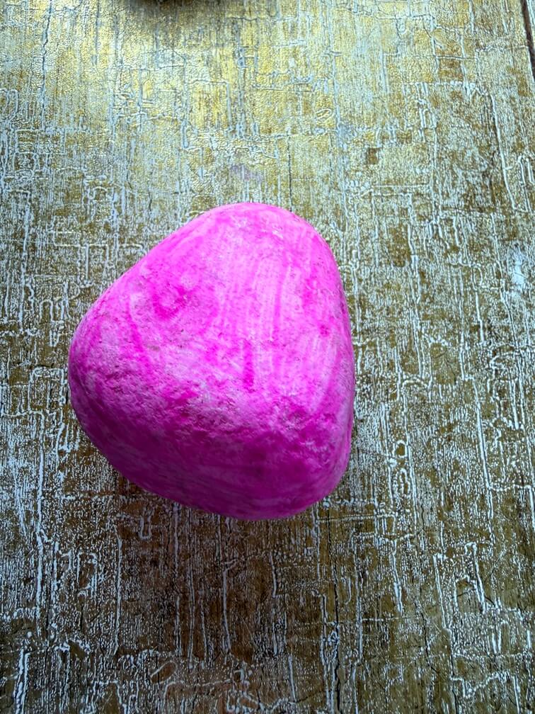 Painted stone No. 46, decorated as: Hot pink