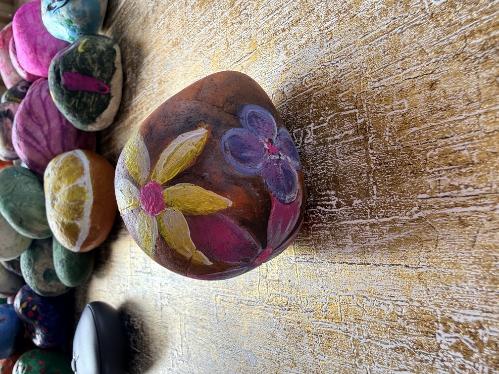 Painted stone No. 51, decorated as: Spring floral