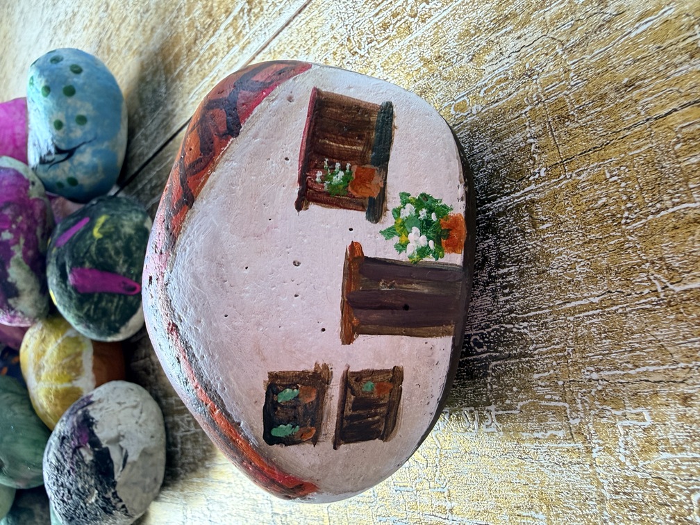 Painted stone No. 55, decorated as: White cottage