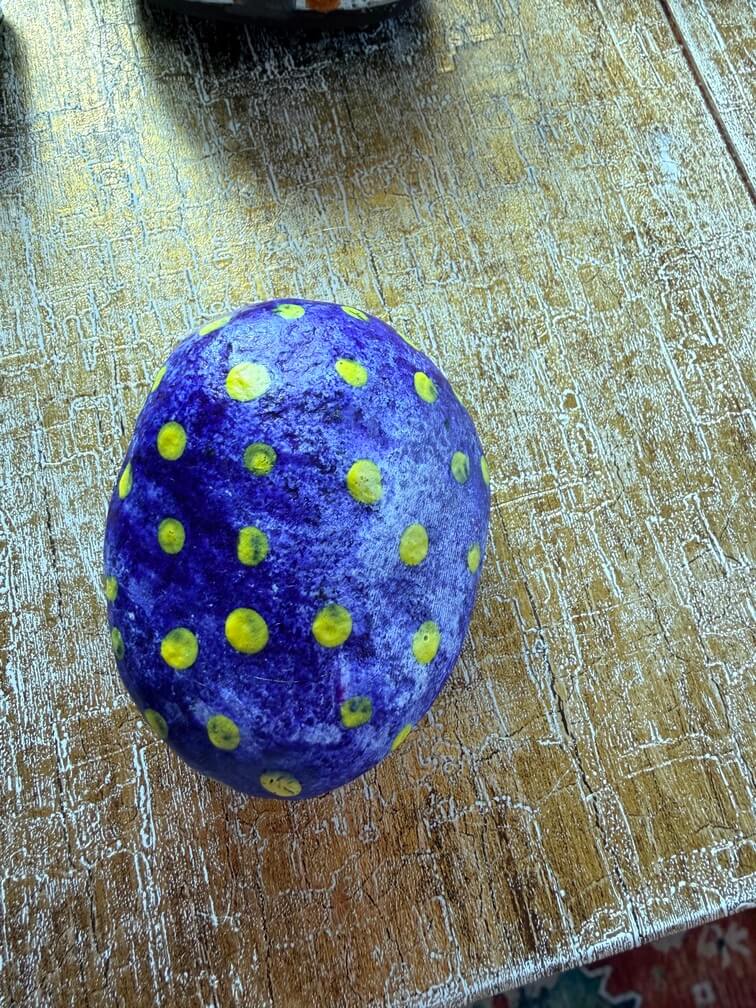 Painted stone No. 61, decorated as: Blue yellow dots